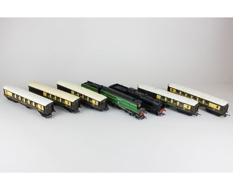 A Hornby 00 gauge Spitfire locomotive with Southern tender, a Bachmann British Railways locomotive and tender with five Pullm