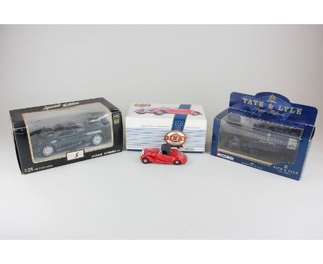 A collection of twenty-three assorted die cast model motor vehicles including a Matchbox Dinky Collection 1939 Triumph Dolomi