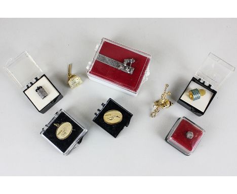 Eight pieces of costume jewellery related to NASA scientist C R Hume (Hawker Siddley Dynamics, NASA), including a tie clip, p