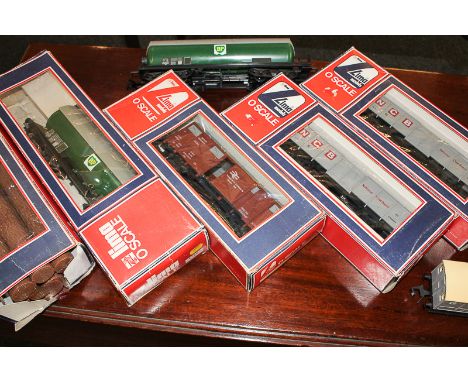 Four Lima 0 scale model railway rolling stock, boxed, together with two Lima rolling stock (one a/f), and five logs