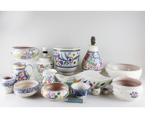 A collection of various Poole pottery, to include vases, jugs, bowls and two lamp bases, two pieces marked Carter Stabler & A