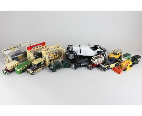 A collection of die cast model motor vehicles by Corgi, Matchbox and others, including a Matchbox Caterpillar Traxcavator in 