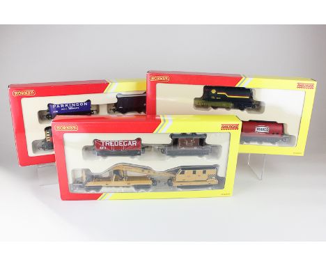 Three Hornby Railroad 00 gauge model railway packs, Railroad Train Pack R2669, Fuel Tanker Pack R6366 and Breakdown Pack R636