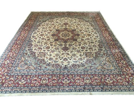 KASHAN DESIGN CARPET, 340cm x 243cm, pendant medallion on an ivory palmette and vine field within complimentary spandels and 