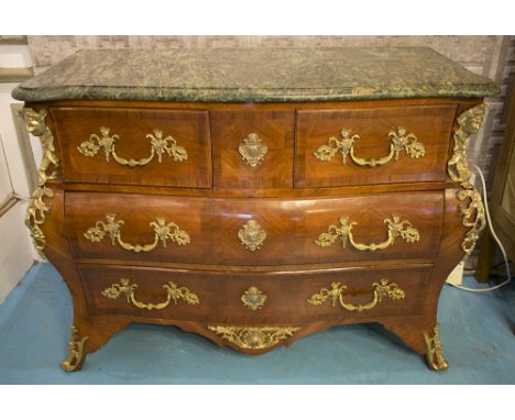 BOMBE COMMODE, Régence style tulipwood and brass mounted with green marble top above two short and two long drawers, stamped 