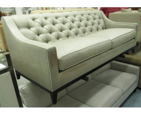 SOFA, buttoned back with sloping arms in shimmering fools gold coloured upholstery, 200cm L x 95cm x 86cm H. (slight mark to 