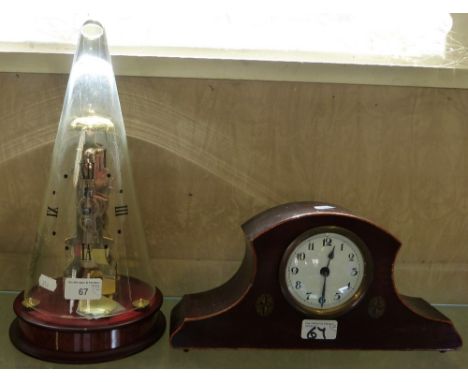 An unusual clock under conical glass dome, bearing the label Schott Duran together with a mahogany mantle clock (2)