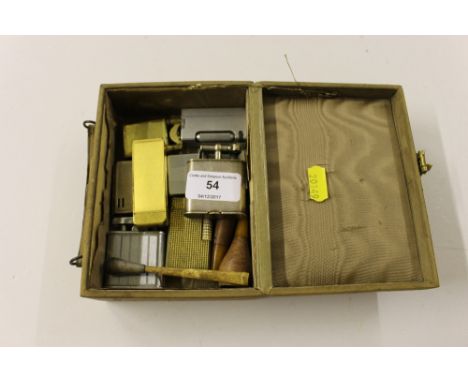 A small case containing gold plated Dunhill lighter; a silver plated Dunhill lighter; and various others 