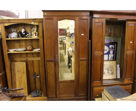 An Edwardian inlaid mahogany mirrored door wardrobe