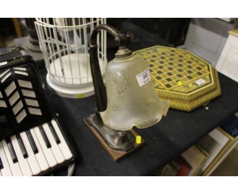 An Art Deco design table lamp with etched glass shade 