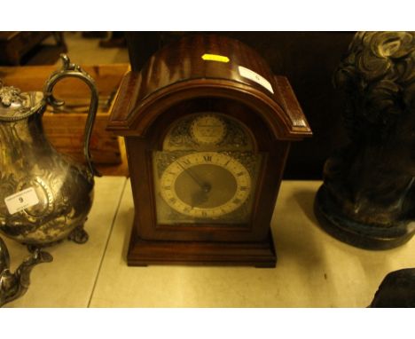 A Cameron Cuss mahoagny cased mantel clock 