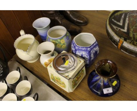 A Ringtons tea caddy; various pottery vases; Art Deco biscuit barrel erc.