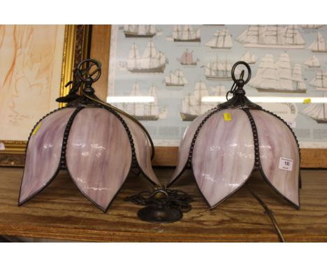 A pair of Tiffany style coloured glass lamp shades