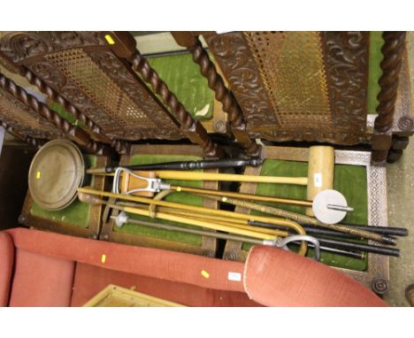 A warming pan; a shooting stick; wooden shafted golf clubs; croquet mallet; walking stick etc. 