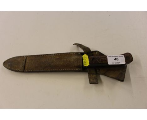 A bayonet fighting knife in scabbard 