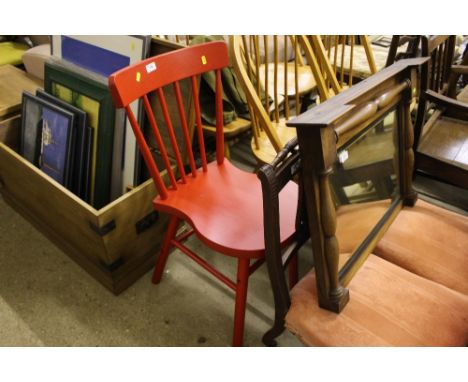 A red stick back kitchen chair 