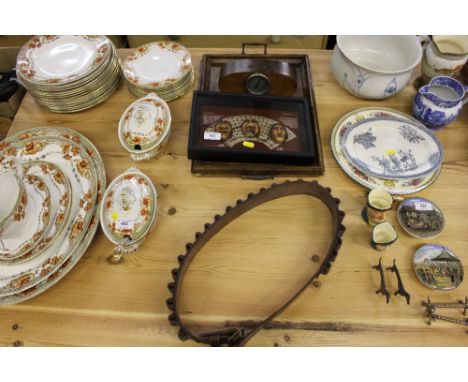 A cartridge belt; a wooden tray; a thermometer inset to teak taken from RMS Mauretania; and a framed collection of three face