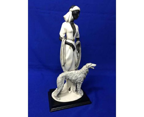 THREE CERAMIC FIGURES OF WOMENincluding a Florence figure of a dancing woman signed Giuseppi Armani and two Priest Marians gi