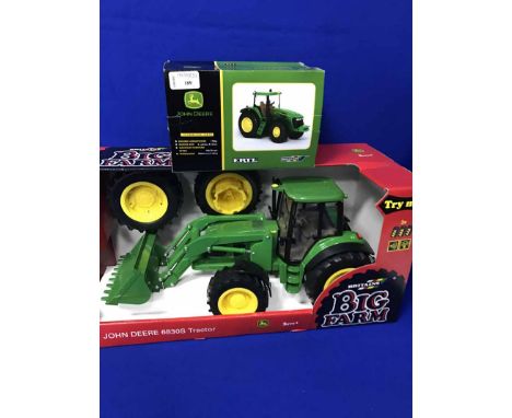 JOHN DEERE 7920 ELECTRICAL TOY CARboxed condition; along with Big Farm John Deere 6830s tractor