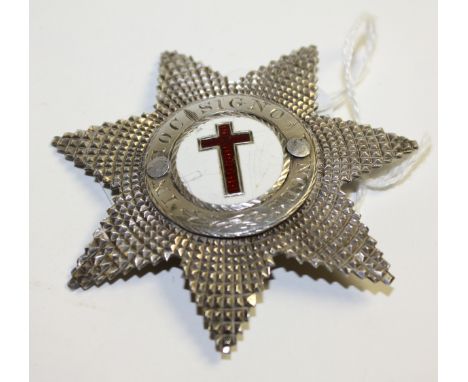 A silver seven point star badge, enamel centre with Latin inscription, Birmingham 1864
