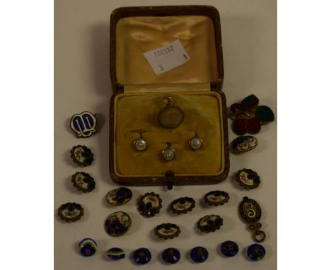 A set of late 19th/early 20th century lady's enamel buttons and backs, painted with flower buds on a blue ground; a Robertson