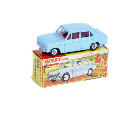 Dinky Toys Triumph 1300 (162). In light blue with red interior, dished spun wheels with black treaded tyres. Boxed. Vehicle M