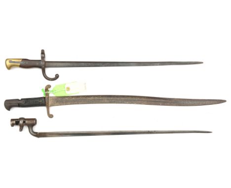 A Gras bayonet, d 1878 on backstrap and a P1876 socket bayonet for Martini Henry rifle, with Indian Army markings (no scabbar
