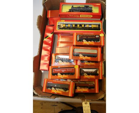 A quantity of OO gauge railway by Hornby. 3 locomotives; a BR Schools Class 4-4-0 locomotive, Dover 30911, in lined green. A 