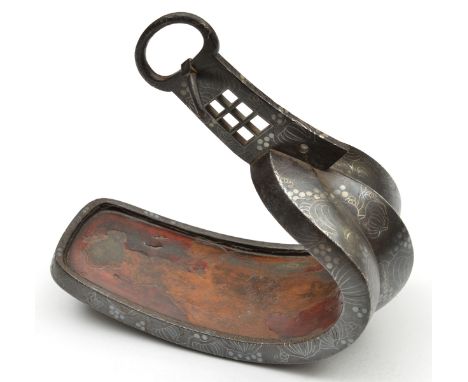 A Japanese iron stirrup abumi. 19th century, of conventional form inlaid overall with silver fruiting gourds (?) and foliage,