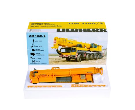 A Liebherr 1:50 scale diecast model Mobile Crane (LTM 1160/2). A highly detailed construction model of a 5-axle extending cra