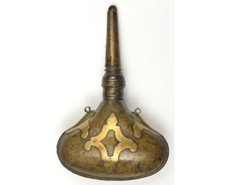 An Indo-Persian brass powder flask.19th century, swollen purse-shaped body with applied devices 18cms tapered spout with meas