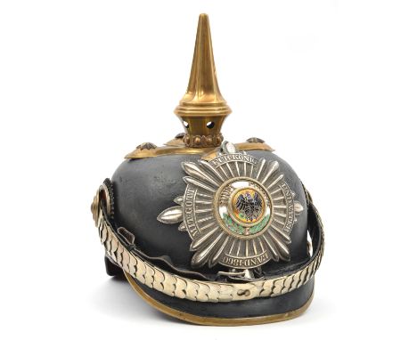 A Prussian Garde officer’s pickelhaube, with enamelled Garde star plate, brass mounts which would originally have been gilt, 