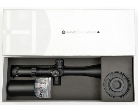 A good Hawke Sidewinder 8-32x56 nitrogen charged telescopic sight, with separate adjuster ring, 2 C spanners for removing len