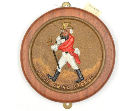A cast brass circular badge of HMS Walker,  V&amp;W class destroyer, 1917-43, showing the red, white, black and gold painted 