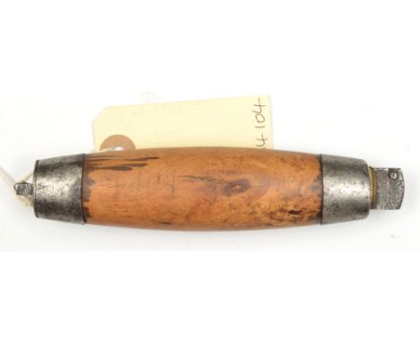 A Swedish barrel knife, steel mounted swollen wood grip containing steel blade 4”, on brass swivel mount, marked Joh. Engelst