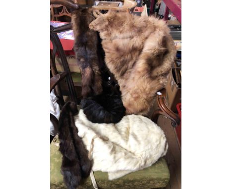 A quantity of vintage fur capes, stoles, hats, etc.