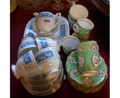 A small quantity of Coalport bone china teaware in the Revelry pattern comprising six trios, milk and sugar and bread and but