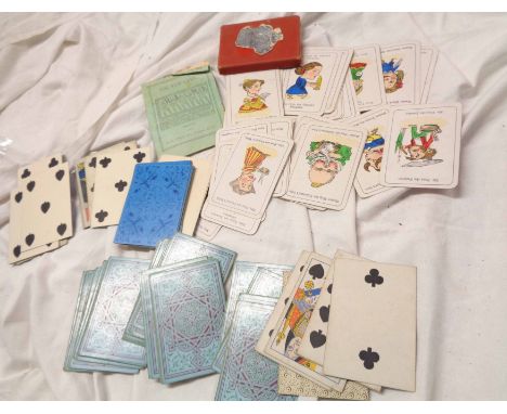 A bag containing a set of 19th Century De La Rue &amp; Co. playing cards and a similar Reynolds &amp; Sons pack - sold with a