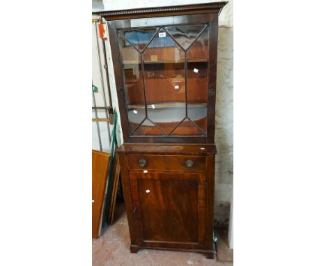 A 63cm 19th Century mahogany and strung book cabinet with beaded glazed panel door to top over a cupboard base with faux draw