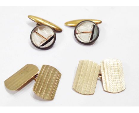 A pair of 9ct. gold panel cufflinks - sold with a pair of Essex crystal cufflinks with sailing vessel panels