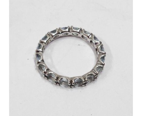 A 375 (9ct.) gold aquamarine set eternity ring - size P 1/2