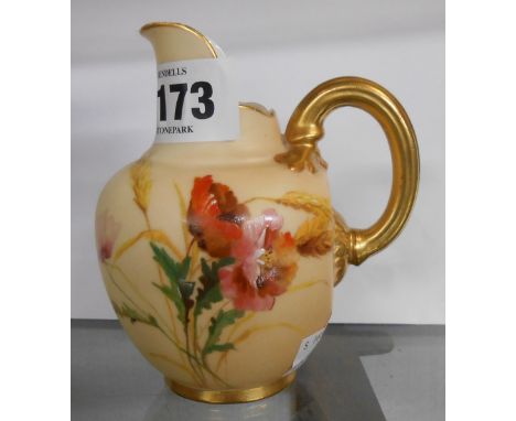 An early 20th Century Royal Worcester porcelain blush ivory small jug of helmet form decorated with hand painted floral spray