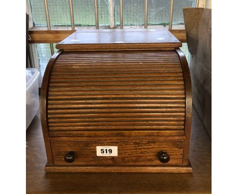 A 28cm vintage oak table-top tambour fronted stationery box with drawer under