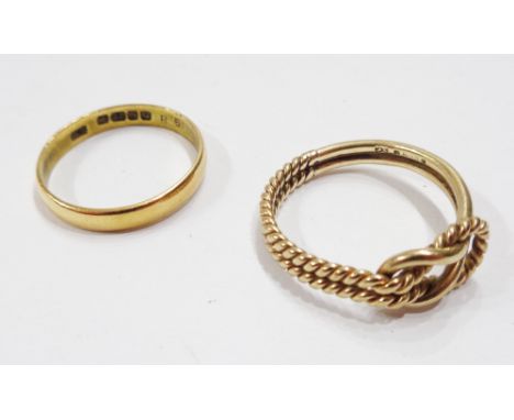 A 22ct. gold wedding band - sold with a 375 (9ct.) gold knot pattern ring - sizes O 1/2 and P 1/2 respectively