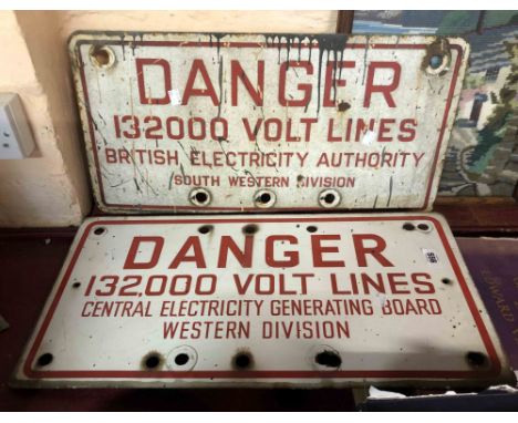 Two vintage electricity warning danger signs with red lettering on white ground
