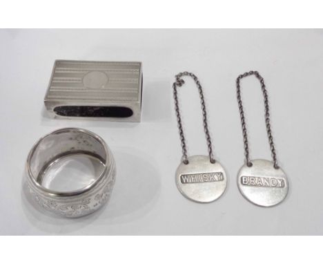 A quantity of silver items comprising Sampson Mordan wine labels, napkin ring and a matchbox sleeve