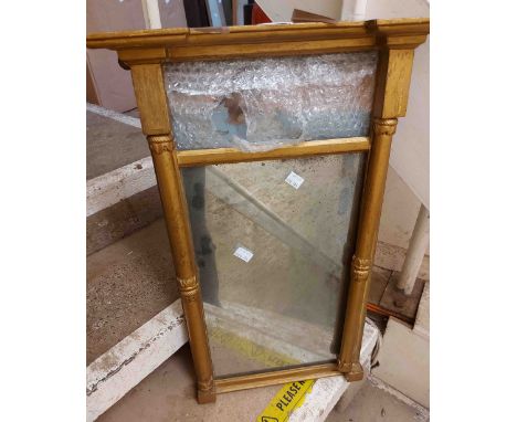 A 19th Century gilt framed pier mirror with remains of painted glass panel to top and flanking acanthus pillars