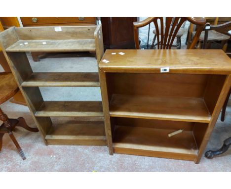 A 66cm vintage polished oak two shelf open bookcase - sold with a four shelf similar