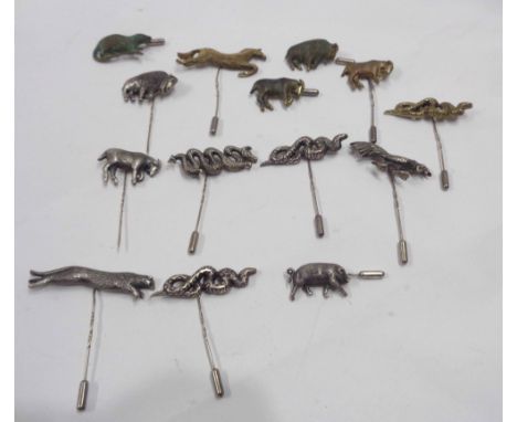 A collection of eight late 20th Century cast silver topped stick pins all featuring animals and serpents by SRP - sold with o