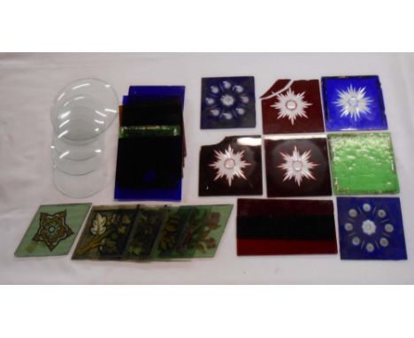 A box containing a quantity of old painted and ruby glass small window panels
